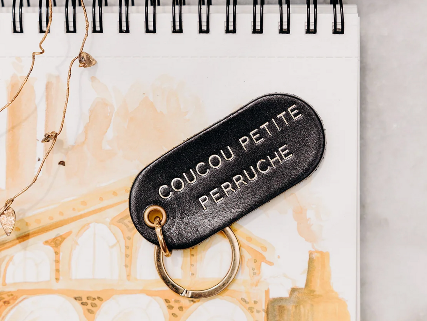 Porte-clé à message en cuir